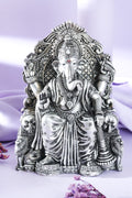 Silver-Tone Ganesha Idol on Ornate Throne